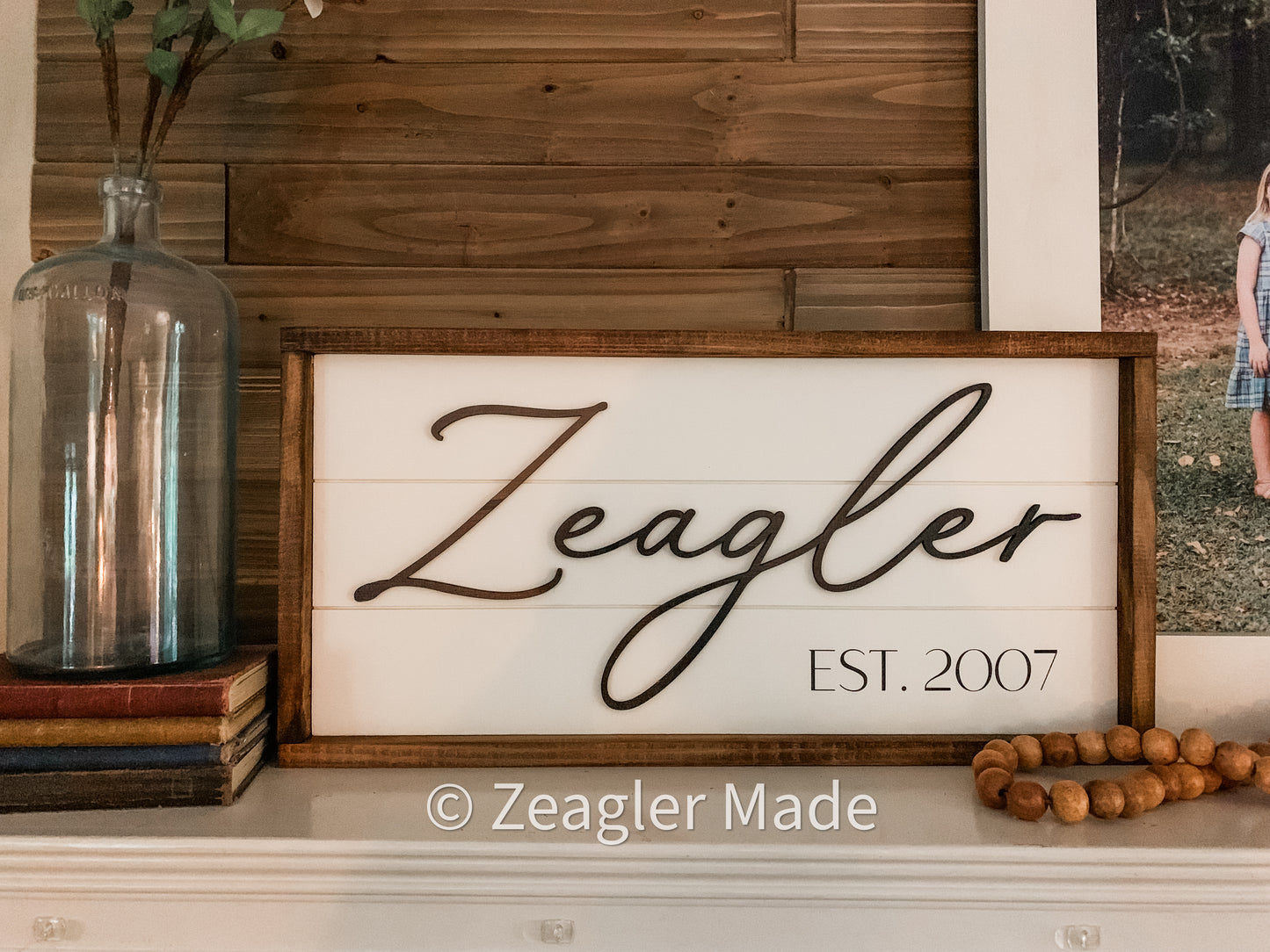 Established Sign with “Shiplap” background Laser-cut name