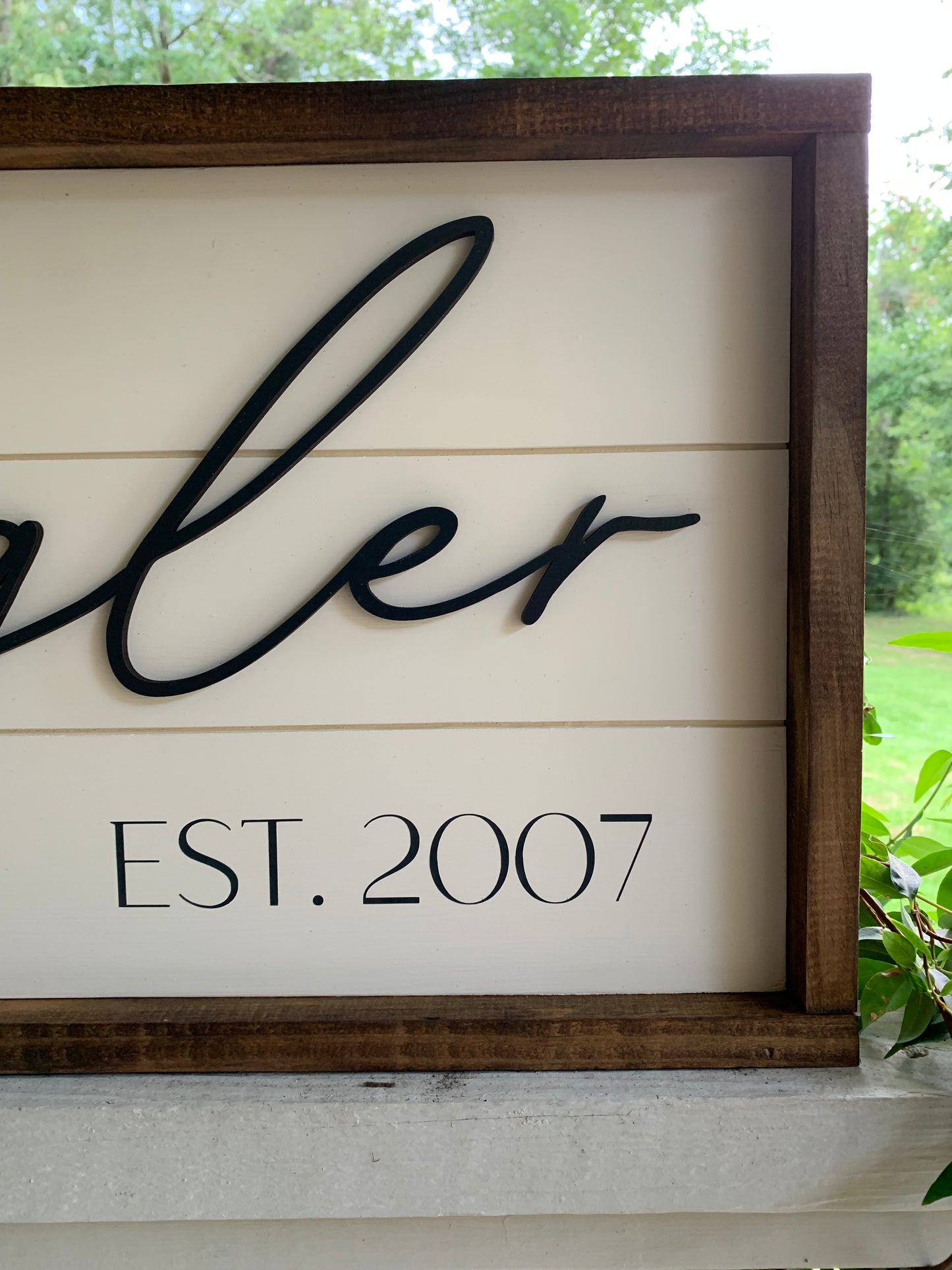 Established Sign with “Shiplap” background Laser-cut name