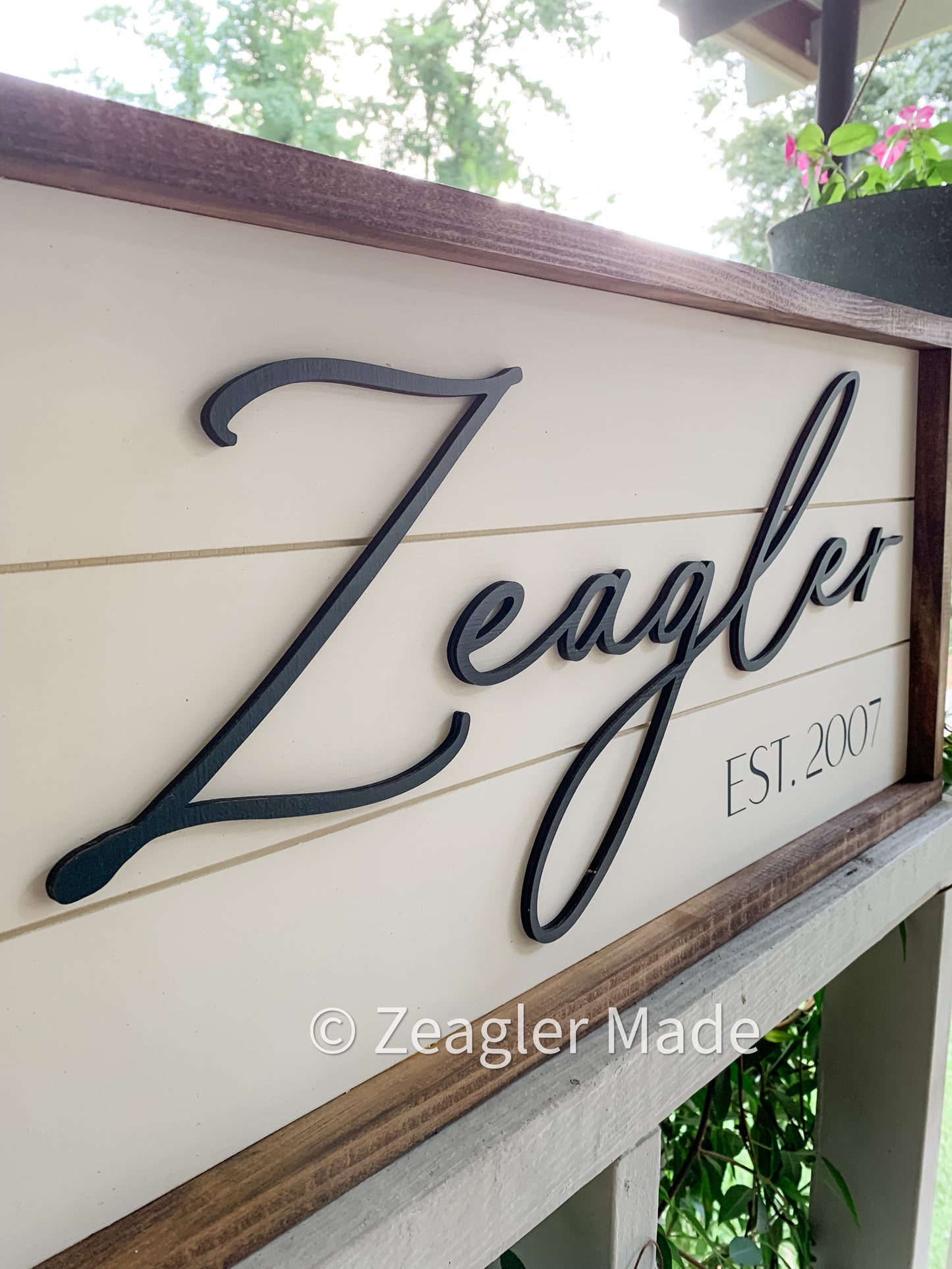 Established Sign with “Shiplap” background Laser-cut name