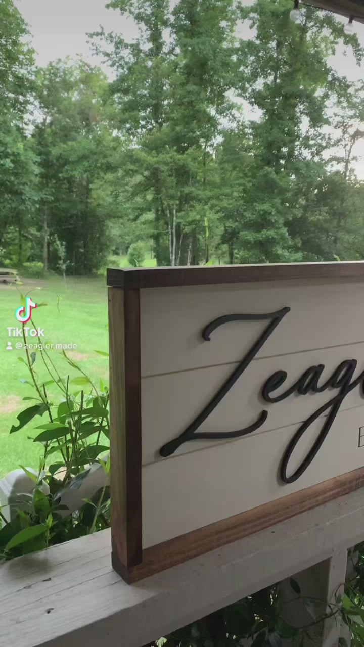 Established Sign with “Shiplap” background Laser-cut name